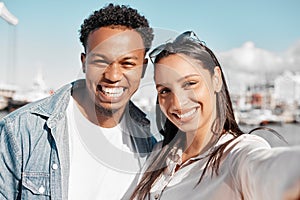 Couple, selfie and love bond on summer date in California by harbor, ocean and sea. Portrait, smile and happy latino man