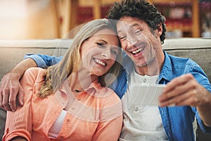 Couple, selfie and sofa in home, smile and excited for memory with bonding for love with connection. People, man and