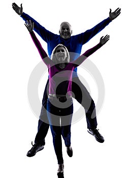 Couple senior jumping happy silhouette