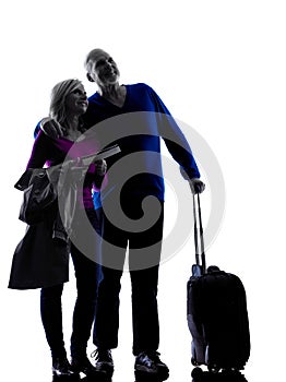 Couple senior travelers traveling silhouette