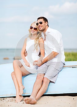 Couple in shades at sea side