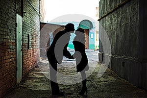 Couple shadow is kissing in tunnel