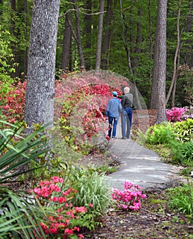 Couple Share a Walk in the South Arkansas Aboretum photo