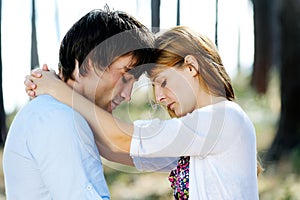 Couple shares a moment in an outdoor shoot