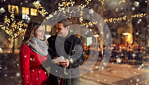 Couple with shopping list for Christmas