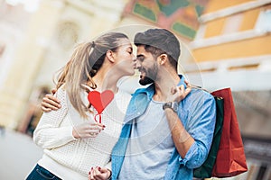 Couple shopping together for Valetine`s day and having fun