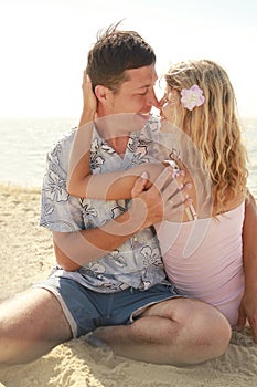 Couple on the shore of the sea