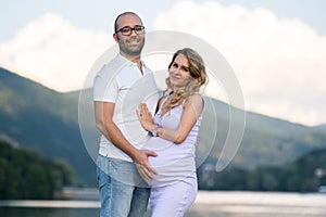 Couple Showing Off Baby Bump 