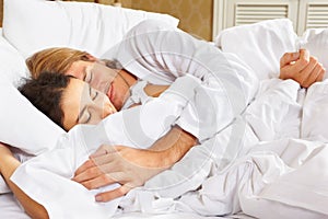 Couple showing romance on bed