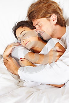 Couple showing romance on bed