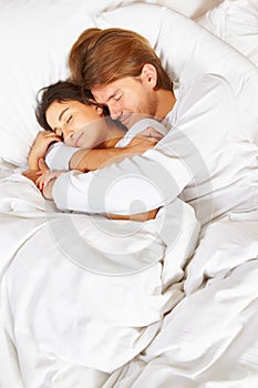 Couple showing romance on bed