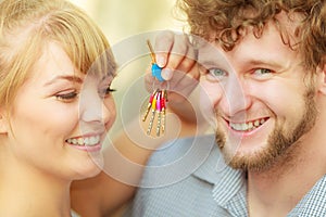 Couple showing their new house keys