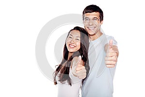 Couple showing thumb up sign