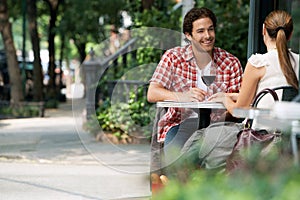 Couple At Sidewalk Cafe