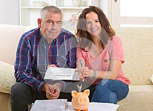 Couple signing life insurance contract