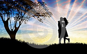Couple silhouette kissing at sunset beautiful nature