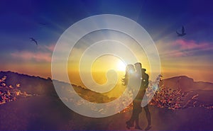 Couple silhouette kissing at sunset, beautiful nature, Unity consciousness, twin flames, lovers