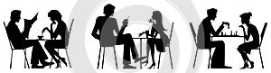 Couple silhouettes near table