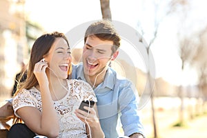 Couple singing together listening to music