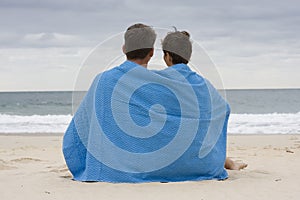 Couple sitting on the beach