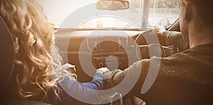 Couple sitting in car during test drive