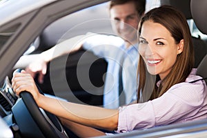 Couple sitting in car