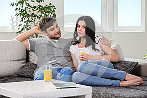 Couple sitting on a couch
