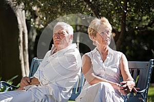 Couple sitting in a garden