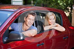 Couple Sitting In New Car