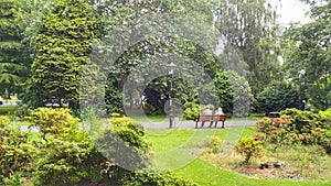 A couple sitting on a park bench at Southampton