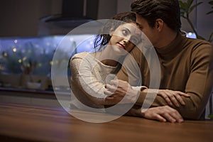 Couple sitting and romancing in the bar