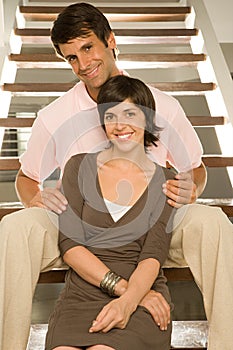 Couple sitting on stairs