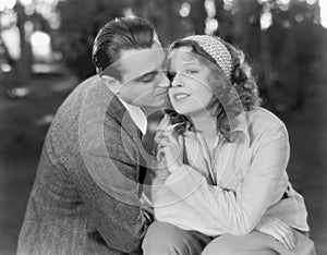 Couple sitting together and affectionate