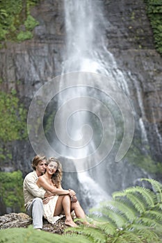 Couple Sitting Waterfalls