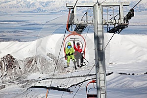 Couple on ski elevator