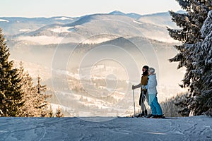 Couple of skiers in the mountains