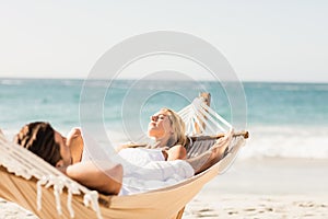 Couple sleeping in hammock