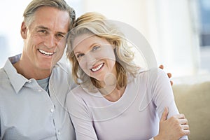 Couple Smiling Together At Home