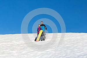 Couple With Snowboard And Ski Resort Snow Winter Mountain Cheerful Hispanic Man Woman