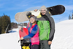 Couple With Snowboard Ski Resort Snow Winter Mountain Smiling Man And Woman Extreme Sport Vacation