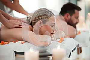 Couple, spa massage or relax wellness in peace, healthcare or reiki hotel salon in self care, muscle tension or stress