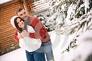 Couple spending time together on snowy day. Winter vacation