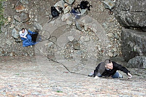 Couple sport rock climbing