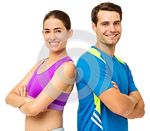 Couple In Sports Wear Standing Back To Back