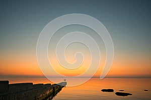 Couple standing on the pier