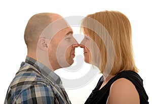 Couple stood nose to nose photo
