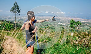 Couple stopping to look the views while doing trail