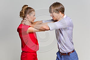 Couple strangling one another photo