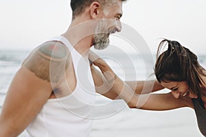 Couple stretching at the beach