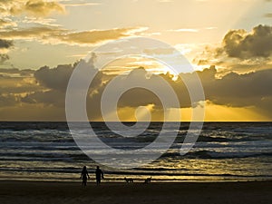 Couple strolling along the ocean